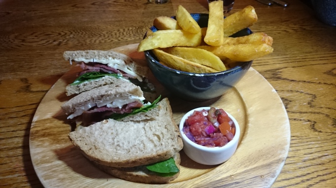 Three Horseshoes Laleham bacon and brie sandwich with chips